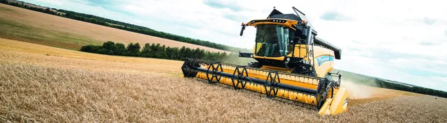 Combine harvester operating a field