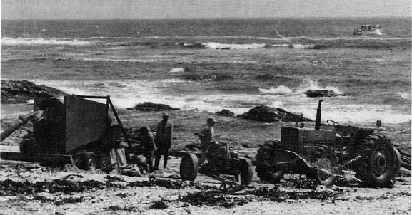 Offshore diamond miners operating in the surf in Namibia